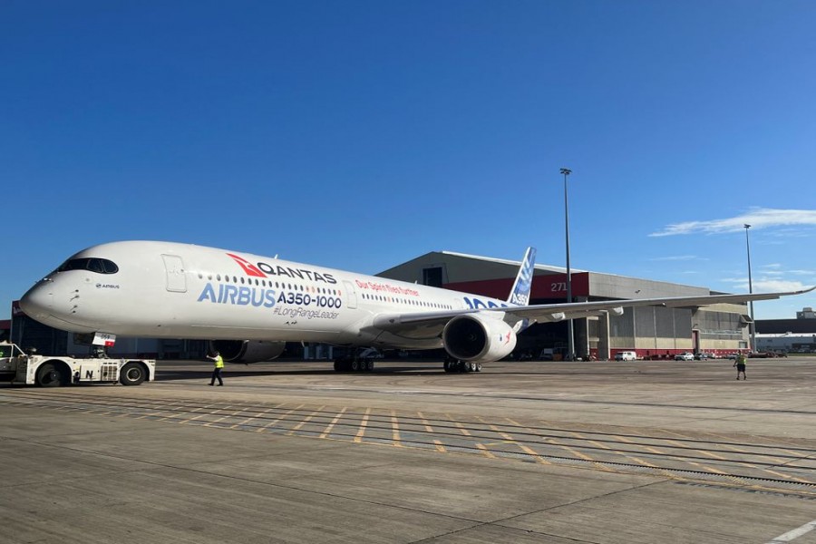 An Airbus A350-1000 test plane arrives at Sydney Airport as the backdrop for Qantas announcing an order for 12 of the planes in Sydney, Australia May 2, 2022. REUTERS/Jamie Freed