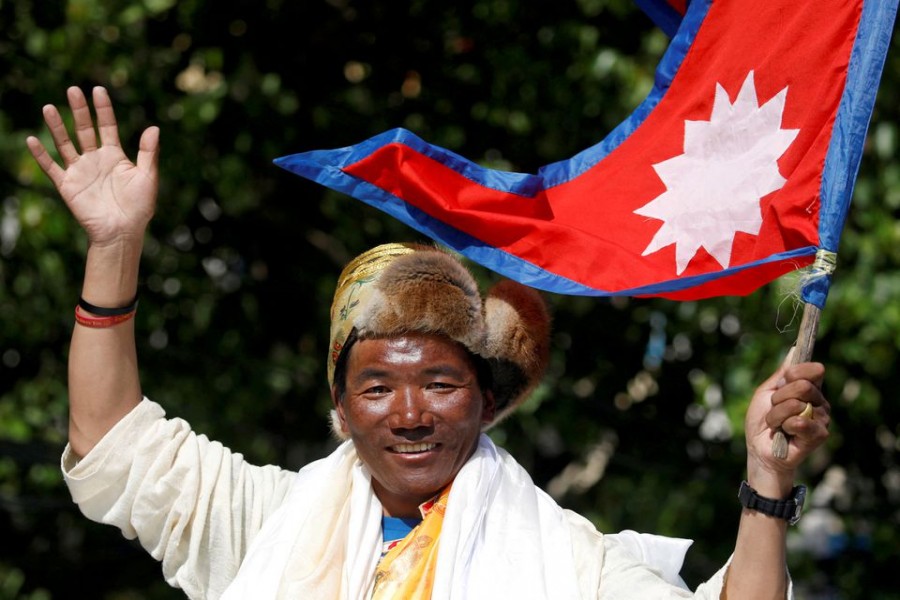 Kami Rita Sherpa, a Nepali mountaineer, waves towards media in Kathmandu, Nepal May 25, 2019. Kami Rita summited Mount Everest on May 7, 2022, for a record 26th time, beating his own record set last year, REUTERS/Navesh Chitrakar