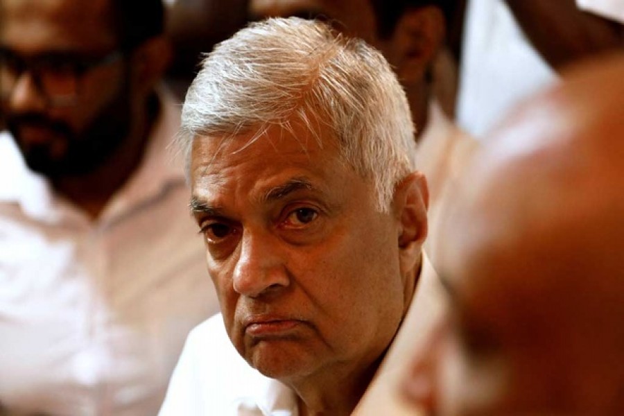 Ranil Wickremesinghe, newly appointed prime minister, arrives at a Buddhist temple after his swearing-in ceremony, amid the country's economic crisis, in Colombo, Sri Lanka, May 12, 2022 — Reuters/Dinuka Liyanawatte