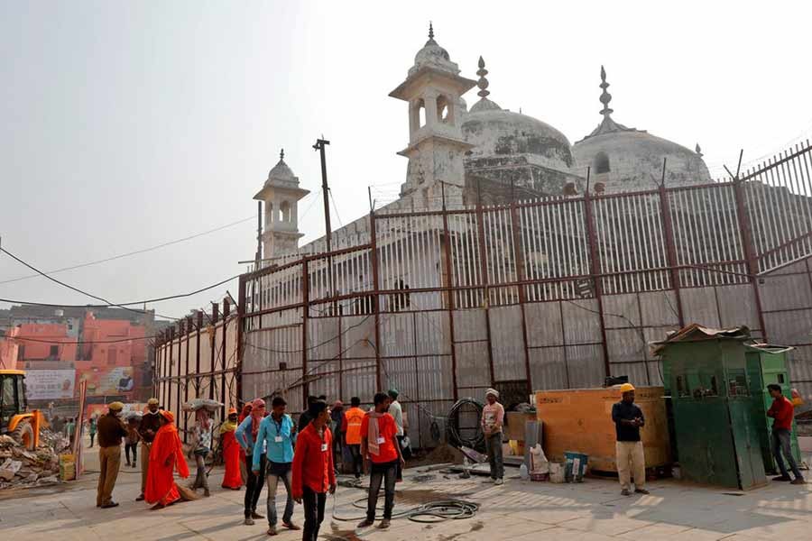 Labourers working in the compound of a temple next to the wall fence of Gyanvapi Mosque in the northern city of Varanasi of India last year –Reuters file photo