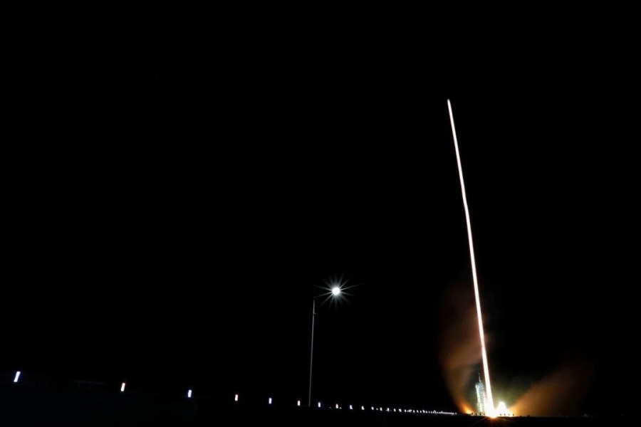 The Long March-2F Y13 rocket, carrying the Shenzhou-13 spacecraft and three astronauts in China's second crewed mission to build its own space station, launches at Jiuquan Satellite Launch Center near Jiuquan, Gansu province, China October 16, 2021. REUTERS/Carlos Garcia Rawlins