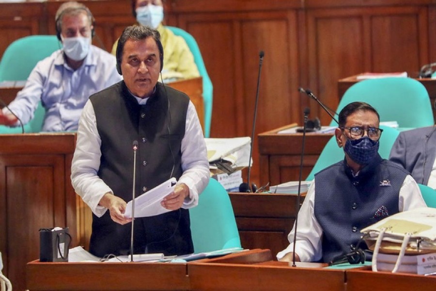 Finance Minister AHM Mustafa Kamal presents the budget for the financial year 2022-23 in parliament on Thursday, Jun 9, 2022. Photo: PID