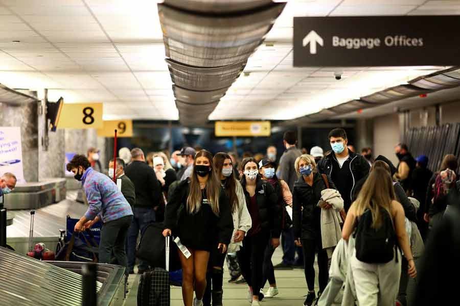 Travelers taking their luggage at the airport in Colorado of United States in 2020 –Reuters file photo