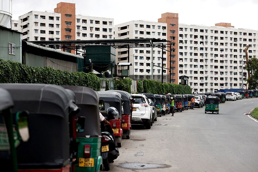 Three-wheeler drivers wait in queue to buy petrol due to fuel shortage, amid the country's economic crisis, in Colombo, Sri Lanka on June 17, 2022 — Reuters photo