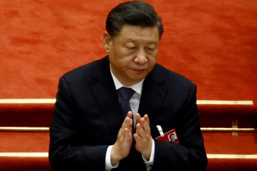 Chinese President Xi Jinping applauds during the closing session of the National People's Congress (NPC) at the Great Hall of the People in Beijing, China on March 11, 2022 — Reuters/Files