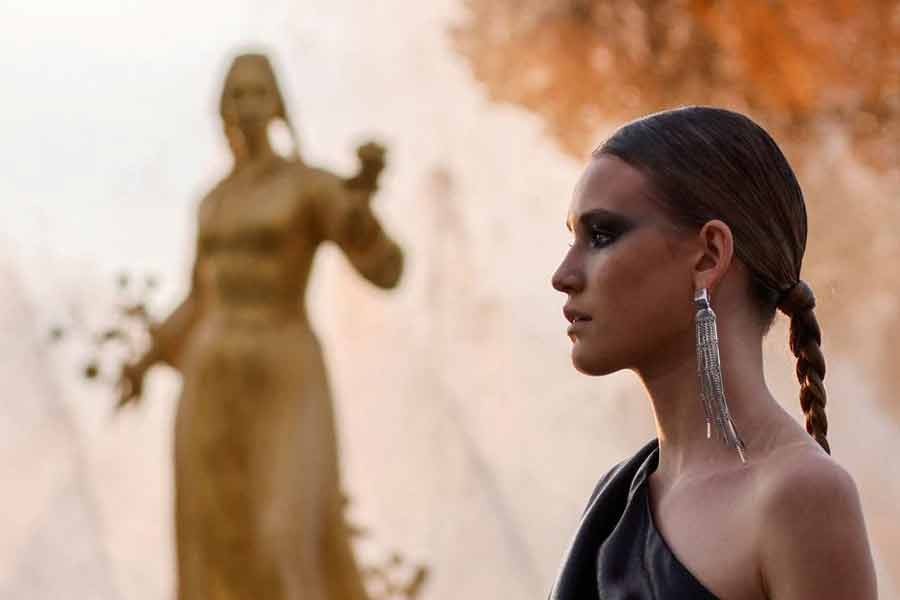 A model presenting a creation by a Russian designer during the Moscow Fashion Week at fountain at the Exhibition of Achievements of National Economy (VDNH) in Moscow on June 21 this year –Reuters file photo