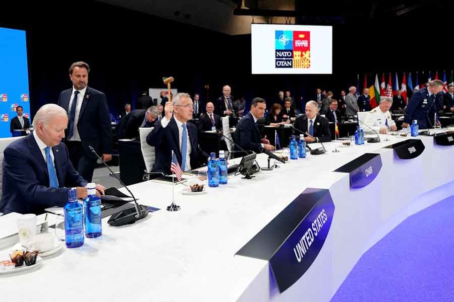 NATO Secretary General Jens Stoltenberg banging a gavel to mark the start of a round table meeting at the NATO summit in Madrid on Wednesday -Reuters photo