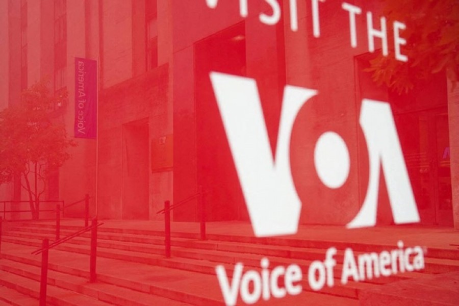 A reflected view of the exterior of the US Agency for Global Media building, where government funded media company Voice of America is based, in Washington, DC, US, June 14, 2022. Reuters