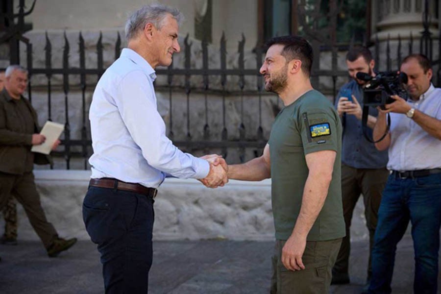 Ukraine's President Volodymyr Zelensky welcomes Norway's Prime Minister Jonas Gahr Stoere before a meeting, as Russia's attack on Ukraine continues, in Kyiv, Ukraine July 1, 2022. Ukrainian Presidential Press Service/Handout via Reuters