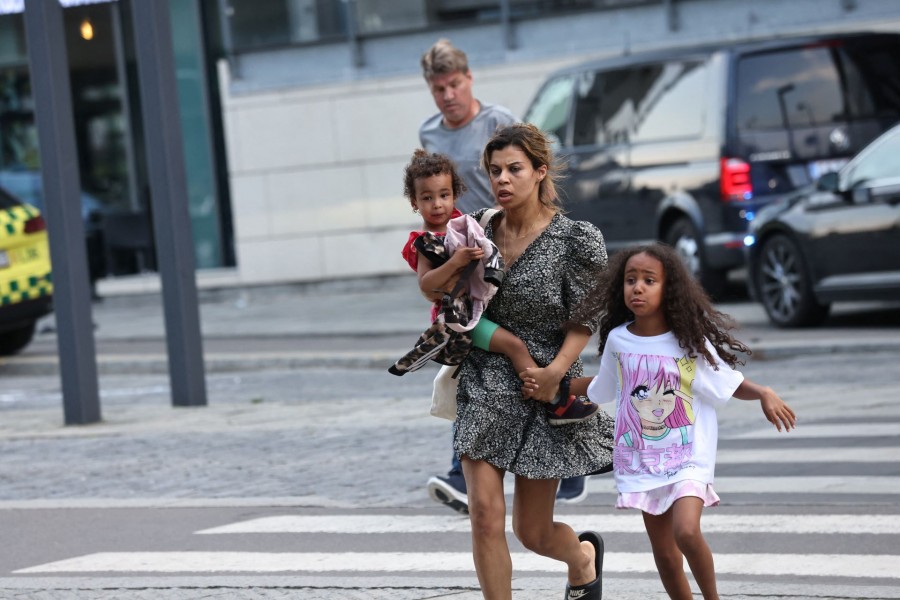 People leave Field's shopping centre, after Danish police said they received reports of shooting, in Copenhagen, Denmark on July 3, 2022 — Ritzau Scanpix via Reuters