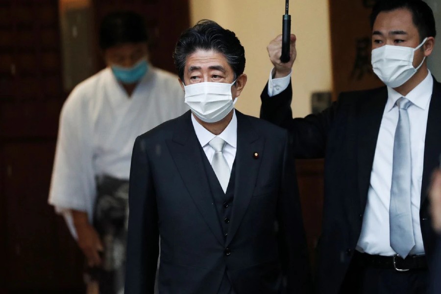 Former Japanese Prime Minister Shinzo Abe visits Yasukuni Shrine in Tokyo, Japan August 15, 2021. REUTERS/Issei Kato