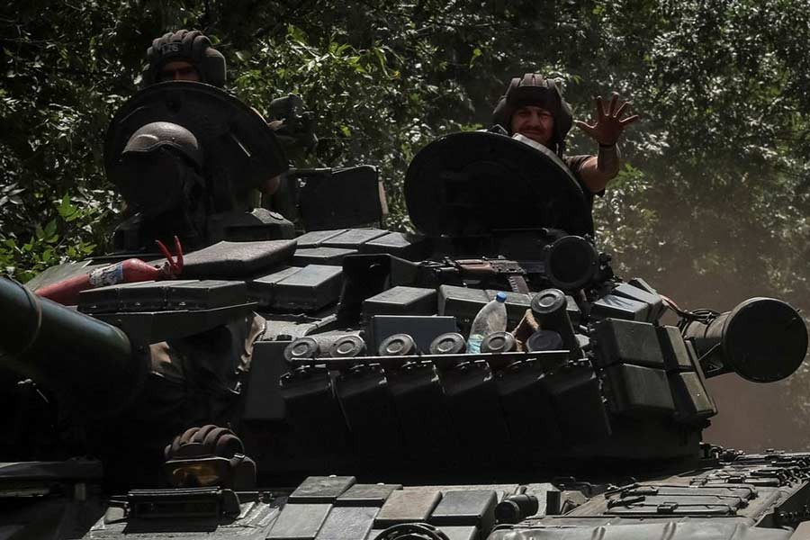 Ukrainian servicemen riding a tank near a frontline in Donbas region of Ukraine on Wednesday –Reuters photo