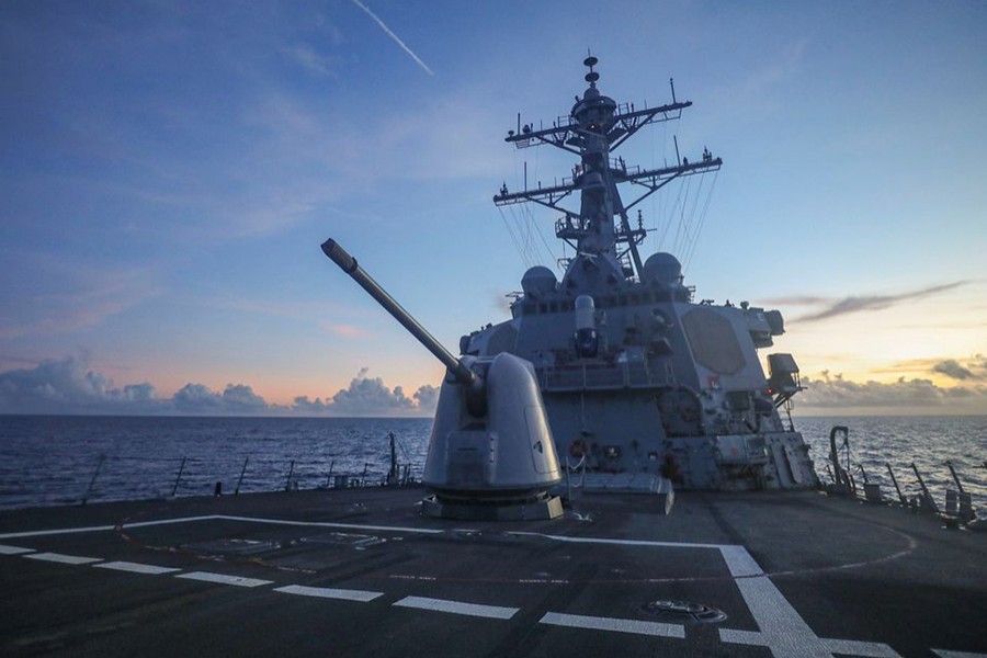 Arleigh Burke-class guided-missile destroyer USS Benfold (DDG 65), forward-deployed to the US 7th Fleet area of operations, conducts underway operations in the South China Sea, in this handout picture released on July 13, 2022 — US Navy/Handout via REUTERS