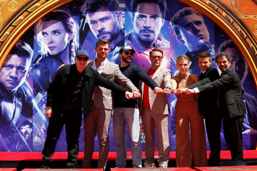 Actors Robert Downey Jr., Chris Evans, Mark Ruffalo, Chris Hemsworth, Scarlett Johansson, Jeremy Renner and Marvel Studios President Kevin Feige pose for a photo during the handprint ceremony at the TCL Chinese Theatre in Hollywood, Los Angeles, California, U.S. April 23, 2019. REUTERS/Mario Anzuon