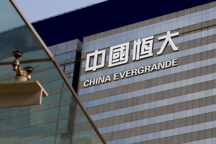 Crisis-hit Evergrande faces deadline after bosses quit