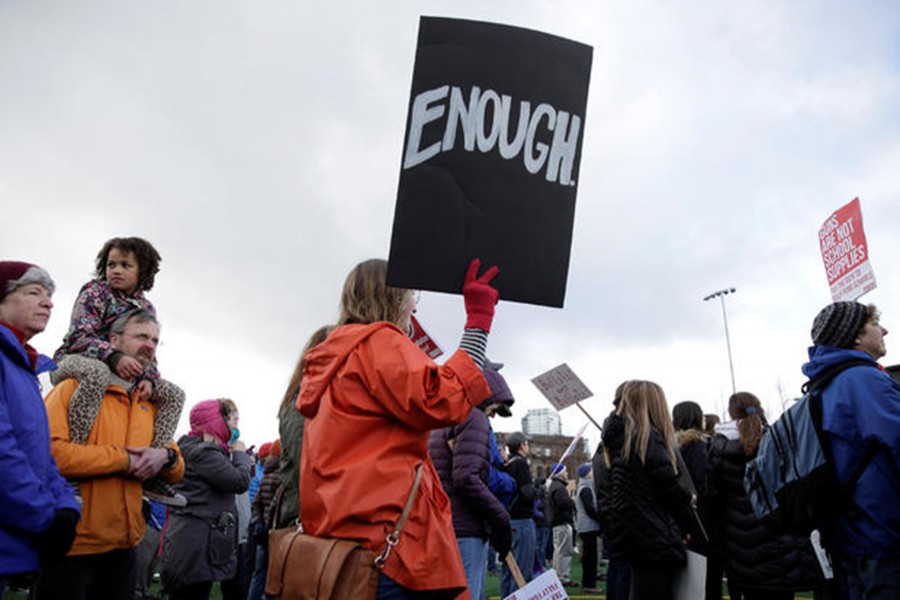 People gather during a "March For Our Lives" demonstration demanding gun control in Seattle, Washington on March 24, 2018 — Reuters/Files