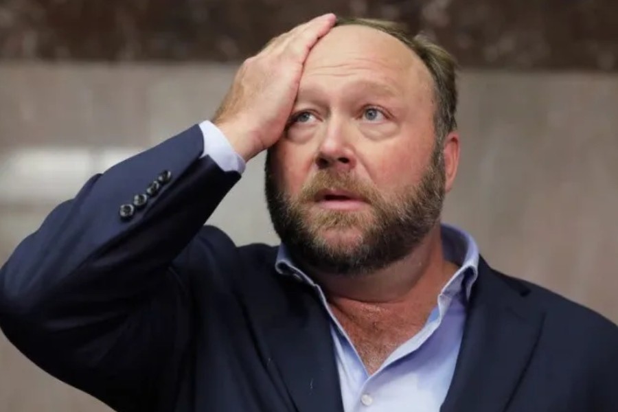 Alex Jones of Infowars talks to the media while visiting the US Senate's Dirksen Senate office building as Twitter CEO Jack Dorsey testifies before a Senate Intelligence Committee hearing on Capitol Hill in Washington, US, September 5, 2018. Twitter permanently banned Jones and Infowars from its platforms September 6 over his actions seen on Twitter while visiting the building. REUTERS/Jim Bourg