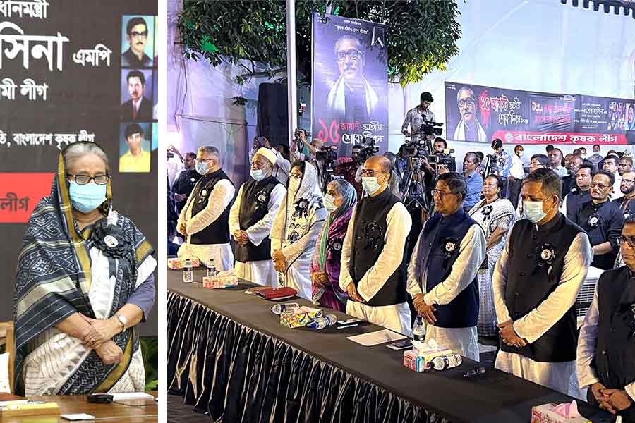 Prime Minister Sheikh Hasina and other participants observing a one-minute silence during a programme on Monday to show due respects to the martyrs of the August 15, 1975, carnage –PID Photo