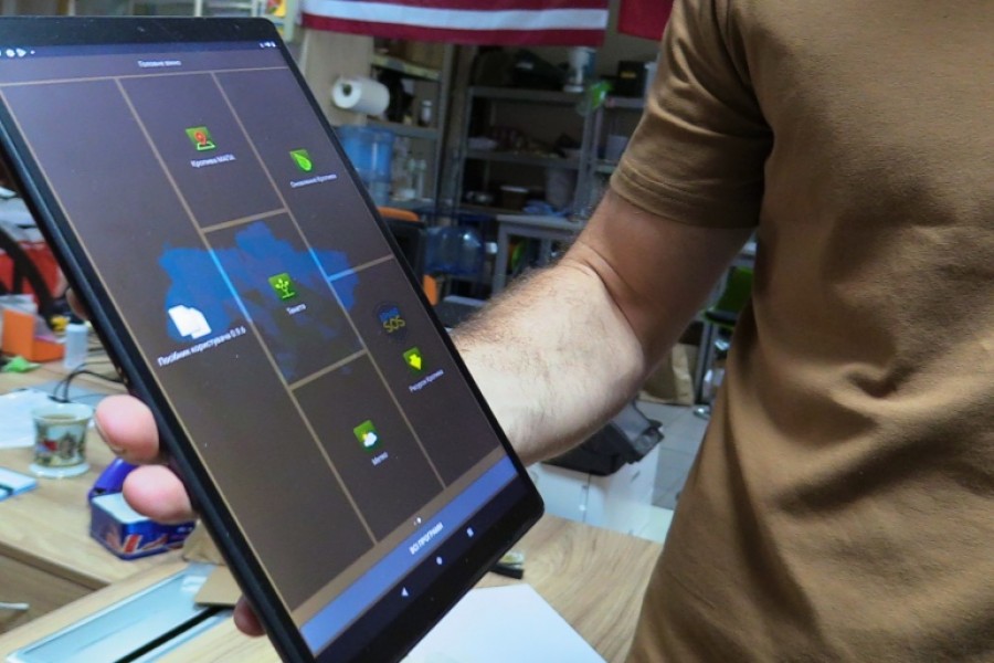 A tablet with Kropiva (Nettle) software, that aids Ukrainian troops in terms of artillery fire precision [Mansur Mirovalev/Al Jazeera]
