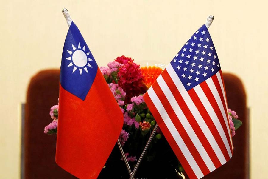 Flags of Taiwan and US are placed for a meeting in Taipei, Taiwan March 27, 2018. REUTERS/Tyrone Siu/File Photo