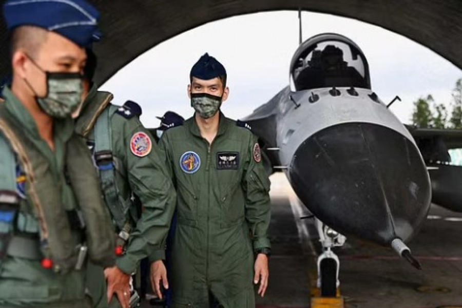 Pilots leave after an event at an Air Force base in Penghu Islands, Taiwan, August 30, 2022. REUTERS/Ann Wang