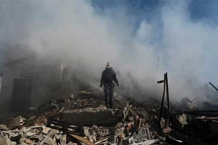 FILE PHOTO: A Ukrainian firefighter puts out fire in a destroyed wholesale market after a Russian strike in Kramatorsk, as Russia's attack in Ukraine continues, in Donetsk region, Ukraine September 3, 2022. Reuters/Ammar Awad