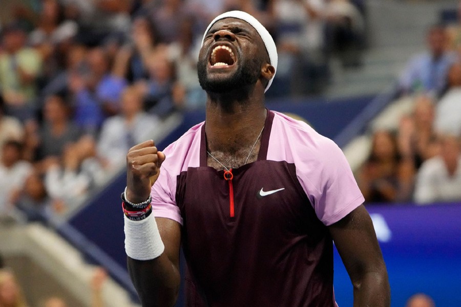 Frances Tiafoe of the USA celebrates after breaking the serve of Rafael Nadal of Spain on day eight of the 2022 US Open tennis tournament at USTA Billie Jean King National Tennis Center on September 5, 2022 — USA TODAY Sports via REUTERS