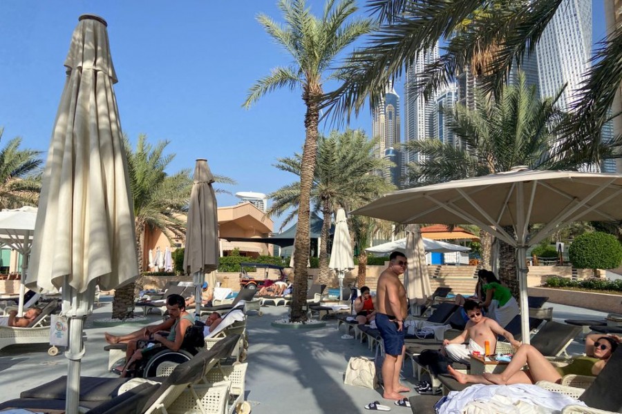 Tourists rest at the Habtoor Grand Resort, in Dubai, United Arab Emirates, February 1, 2022. REUTERS/Abdel Hadi Ramahi