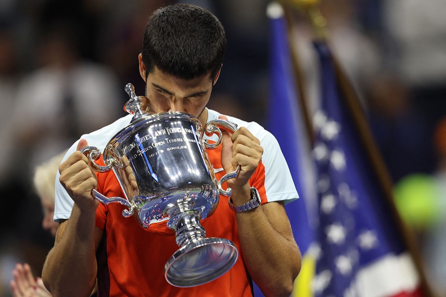 Spain's Carlos Alcaraz celebrates with the trophy after winning the US Open on September 11, 2022  — Reuters photo