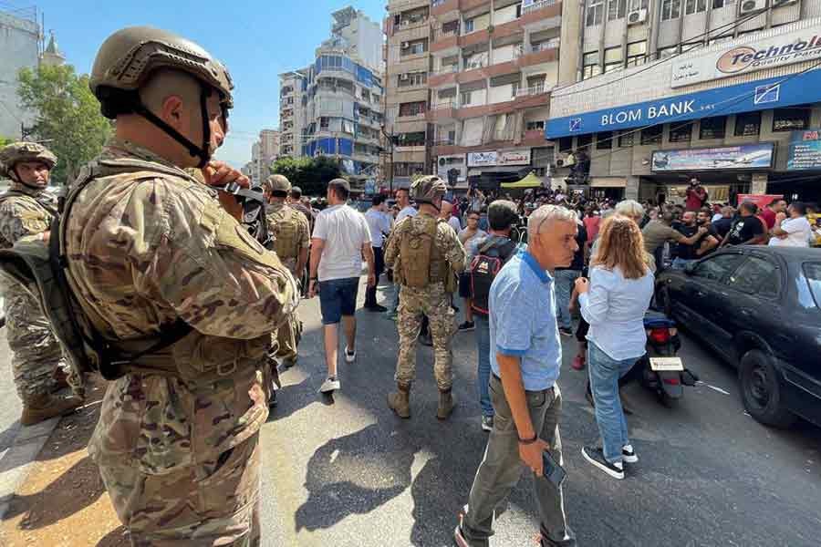 Lebanese army soldiers standing guard outside a Blom Bank branch, which was held up by a depositor seeking access to his own savings, in the Tariq al-Jdideh neighborhood in Beirut of Lebanon on Friday –Reuters photo