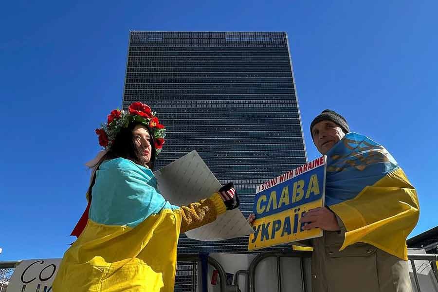 People showing support for Ukraine holding signs across the street from the United Nations (UN) headquarters building in the Manhattan borough of New York City on March 4 this year –Reuters file photo