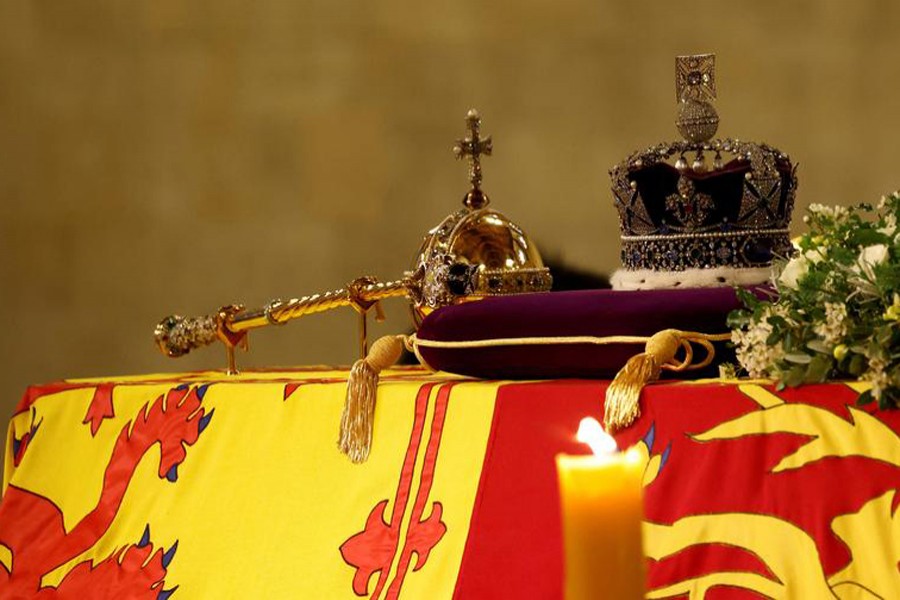 The Imperial State Crown lays atop the coffin of Queen Elizabeth II as it Lies in State inside Westminster Hall, at the Palace of Westminster in London, Britain on September 15, 2022 — Pool via Reuters