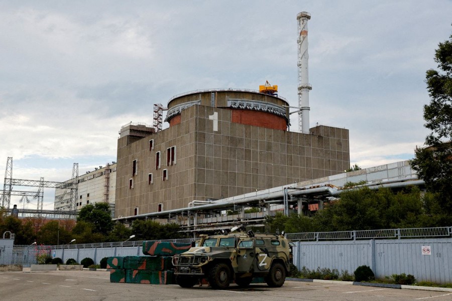 A Russian all-terrain armoured vehicle is parked outside the Zaporizhzhia Nuclear Power Plant during the visit of the International Atomic Energy Agency (IAEA) expert mission in the course of Ukraine-Russia conflict outside Enerhodar in the Zaporizhzhia region, Ukraine, September 1, 2022. REUTERS/Alexander Ermochenko/File Photo