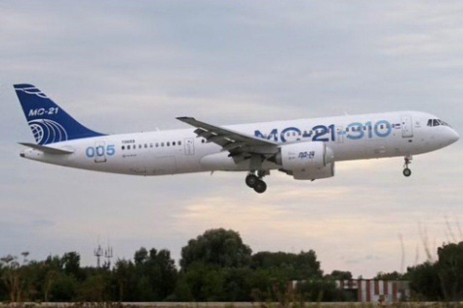 The MC-21-310 medium-range airliner, fitted with the Russian Aviadvigatel PD-14 turbofan engines, performs a test flight at the Ramenskoye airfield in the Moscow region, Russia, Aug 10, 2022. REUTERS/Marina Lystseva/File Photo