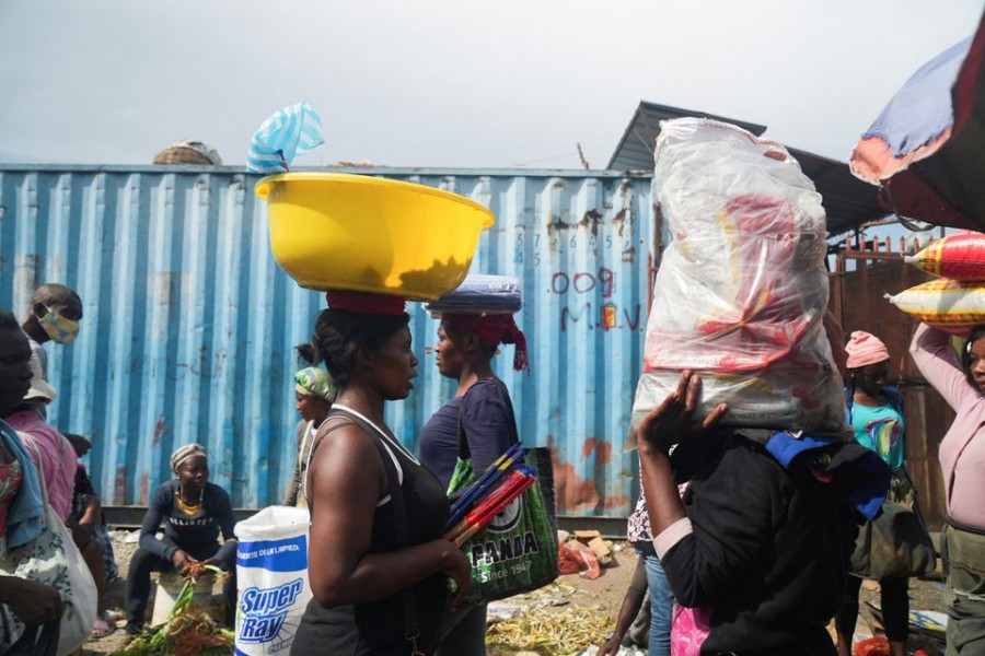 People stock up on food at a market amid shortages of water, cooking gas and other items after days of protest forced them to shelter at home, in Port-au-Prince, Haiti on September 17, 2022 — Reuters photo