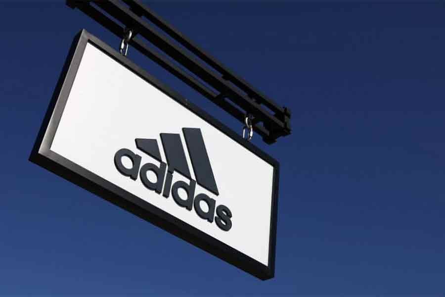 Adidas puts partnership with Kanye West under review