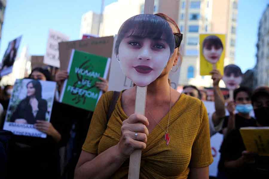 Protesters gathering in support of Iranian women and against the death of Mahsa Amini at Callao square in Madrid of Spain on October 1 this year –Reuters file photo