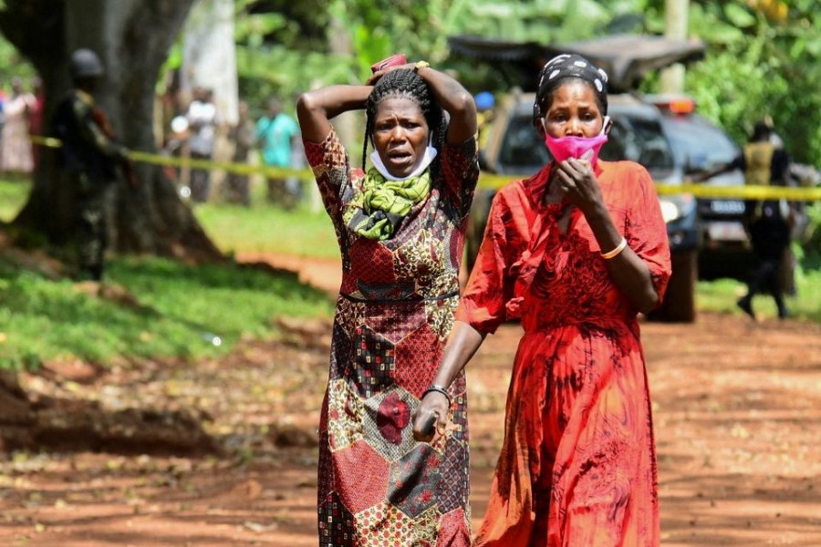 Parents react at the Salaama School for the Blind following a fire in a dormitory building in Luga Village, Ntanzi Parish of Mukono District, near Kampala, Uganda October 25, 2022. REUTERS/Abubaker Lubowa