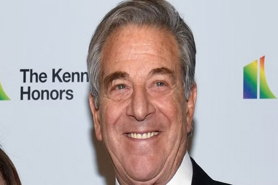 Paul Pelosi, husband of US House Speaker Nancy Pelosi, poses for photographers as they arrive for the 2019 Kennedy Center Honors gala dinner at the US State Department, in Washington, US, Dec 7, 2019. REUTERS/Mike Theiler