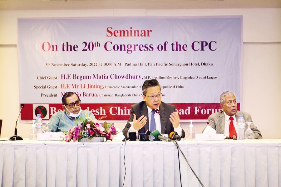 Chinese Ambassador to Bangladesh Li Jiming responds to a question during a seminar on the 20th congress of the Communist Party of China (CPC), organised by the Bangladesh China Silk Road Forum at a city hotel on Saturday. — FE photo