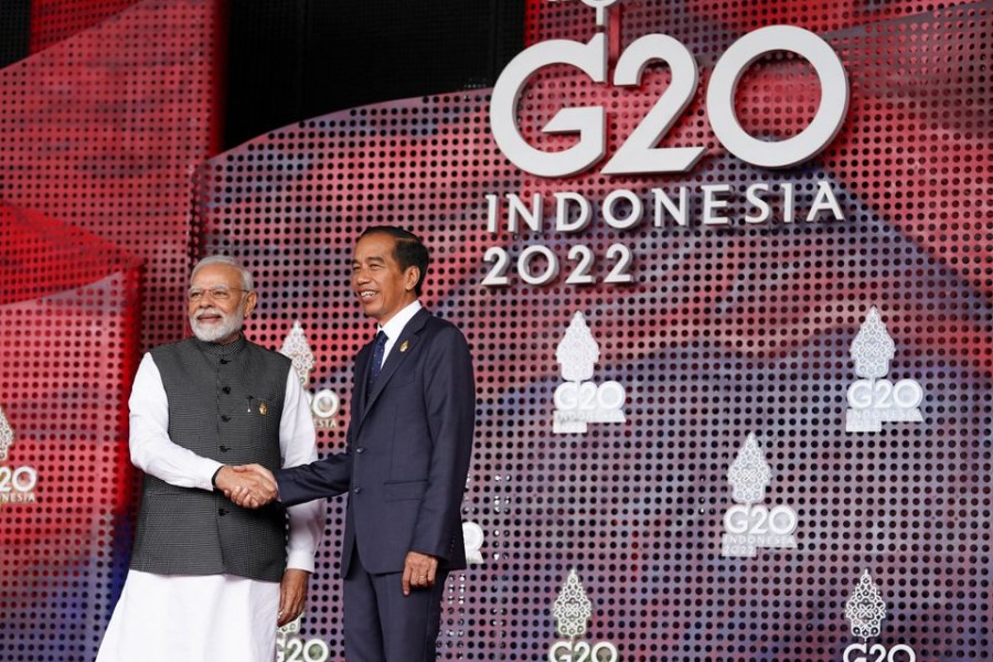 India's Prime Minister Narendra Modi greets Indonesia's President Joko Widodo as he arrives for the G20 leaders' summit in Nusa Dua, Bali, Indonesia on November 15, 2022 — Reuters photo