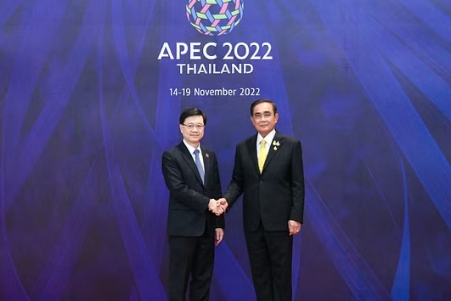 Thailand's Prime Minister Prayuth Chan-ocha welcomes Hong Kong Chief Executive John Lee to the APEC Summit 2022 in Bangkok, Thailand Nov 18, 2022.REUTERS