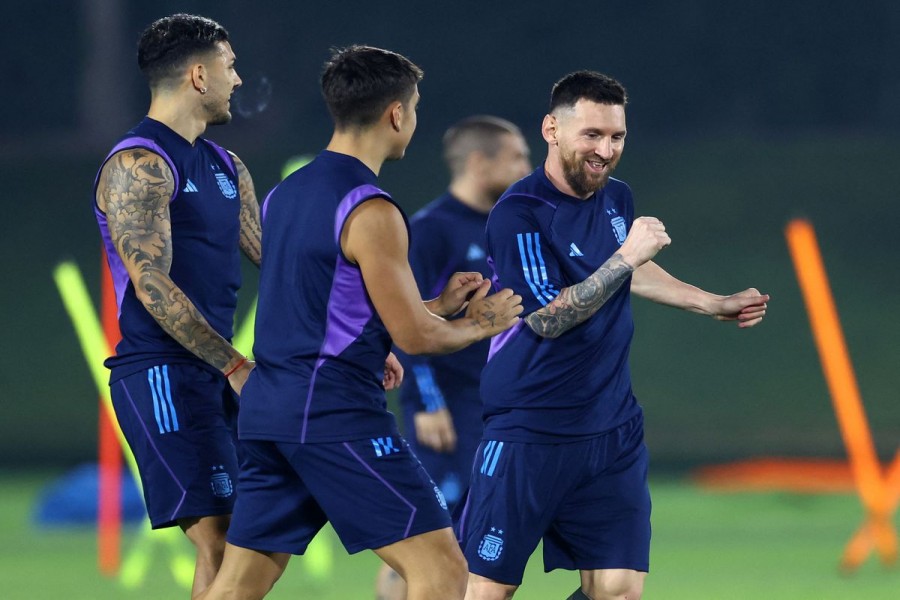 FIFA World Cup Qatar 2022 - Argentina Training - Qatar University Training Site 3, Doha, Qatar - December 17, 2022 Argentina's Lionel Messi, Paulo Dybala and Leandro Paredes during training REUTERS/Carl Recine