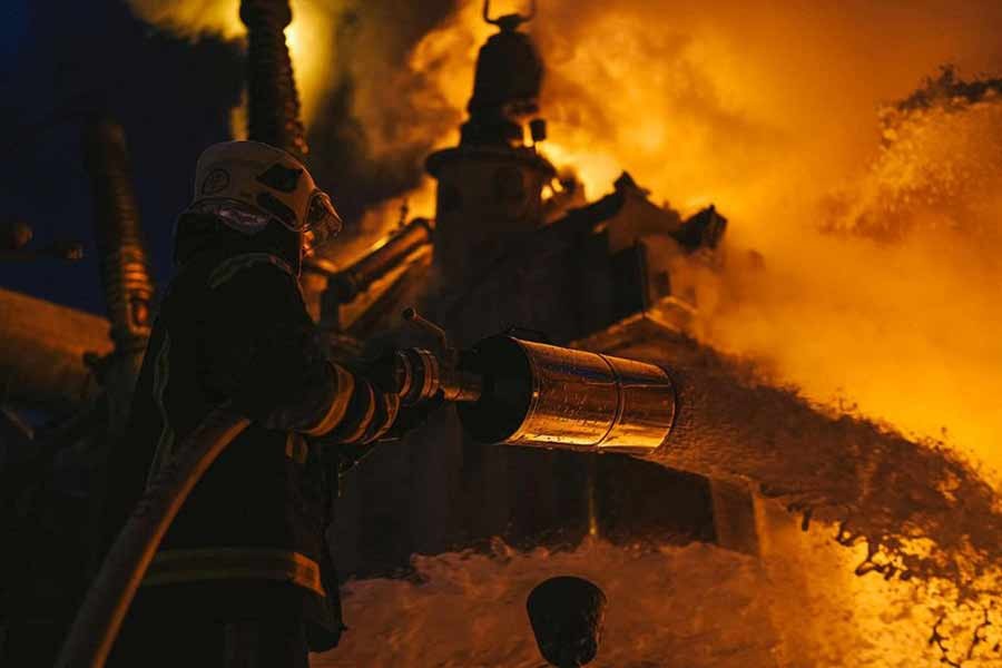 Fire-fighters working at a site of a critical power infrastructure object, which was hit during Russia's drones attacks in Kyiv, Ukraine, in this handout picture released on Monday –Reuters photo