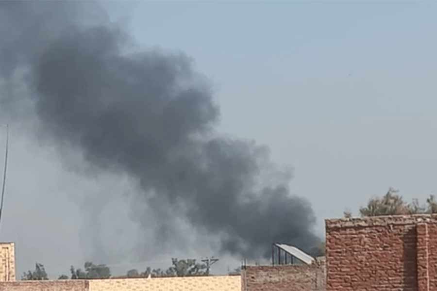 Smoke rising in the distance after security forces launched an operation to retake a counter-terrorism interrogation centre in southern Khyber Pakhtunkhwa province of Pakistan on Tuesday two days after it was seized by Islamist militants –Dawn photo