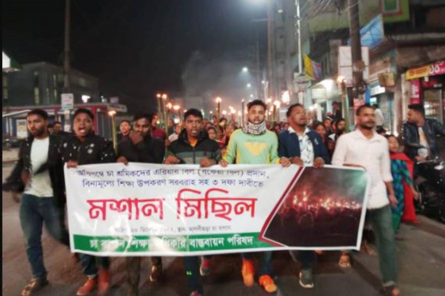 Tea workers bring out torch procession demanding dues in Sylhet 