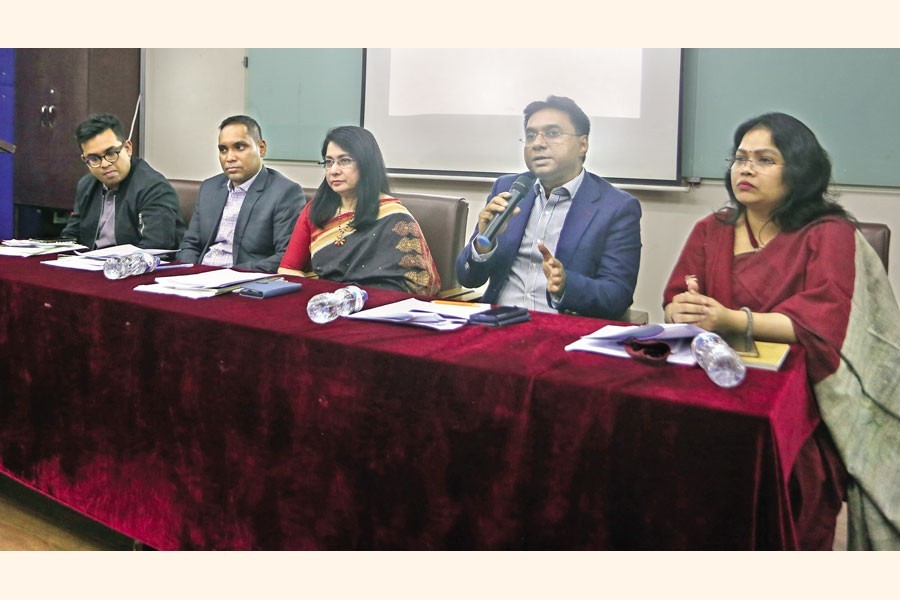 Dr Selim Raihan, professor of the Department of Economics at Dhaka University (DU), speaks at a dialogue on 'Labour Market Recovery in Bangladesh: Prospects amid the Global Recession', organised by the DU's Economics Study Centre on its campus on Thursday — FE photo