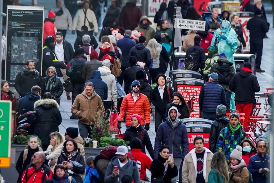 People walk on Times Square in Manhattan as according to a United Nations report, the world's population is estimated to reach 8 billion by November 15 of this year, in New York, US on November 14, 2022 — Reuters/Files