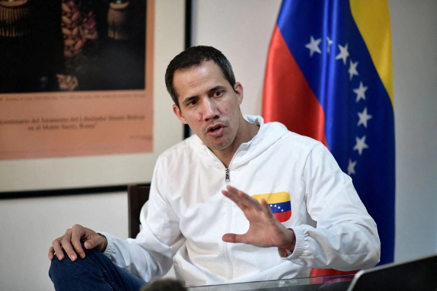 Venezuelan opposition leader Juan Guaido speaks during an interview with Reuters, in Caracas, Venezuela, December 6, 2022. REUTERS/Gaby Oraa