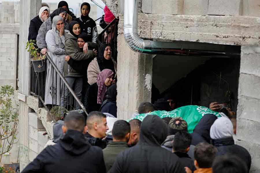 Relatives mourning during the funeral of Palestinian Fouad Abed, who was killed in an Israeli raid, in Kafr-Dan village in the Israeli-occupied West Bank on Monday –Reuters photo